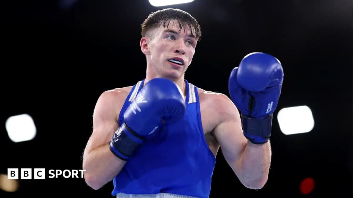 Boxeador en el ring con guantes azules