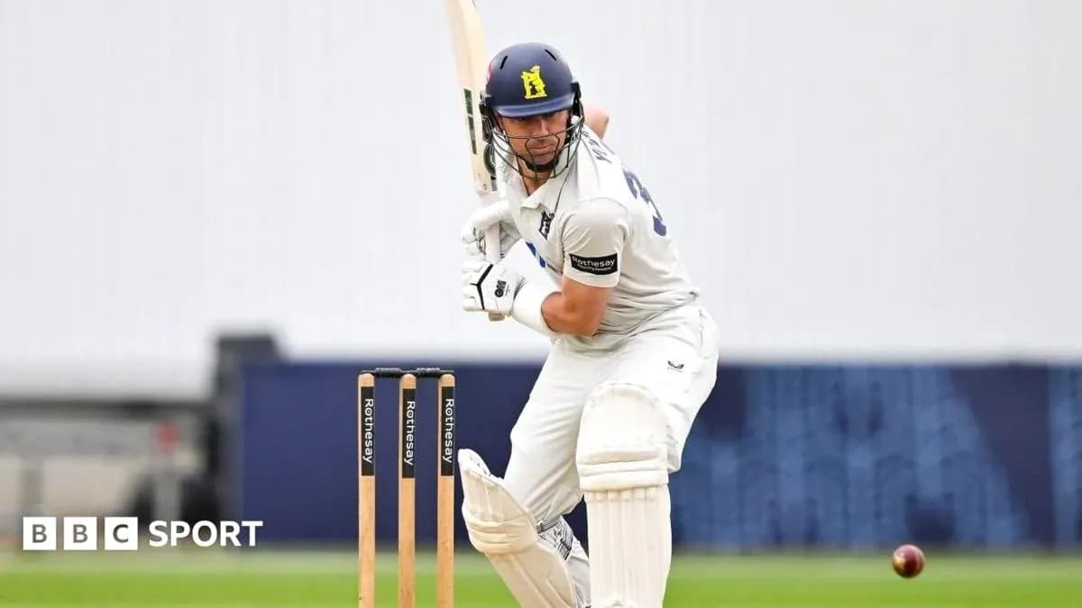 Bateador preparando un golpe en partido de cricket