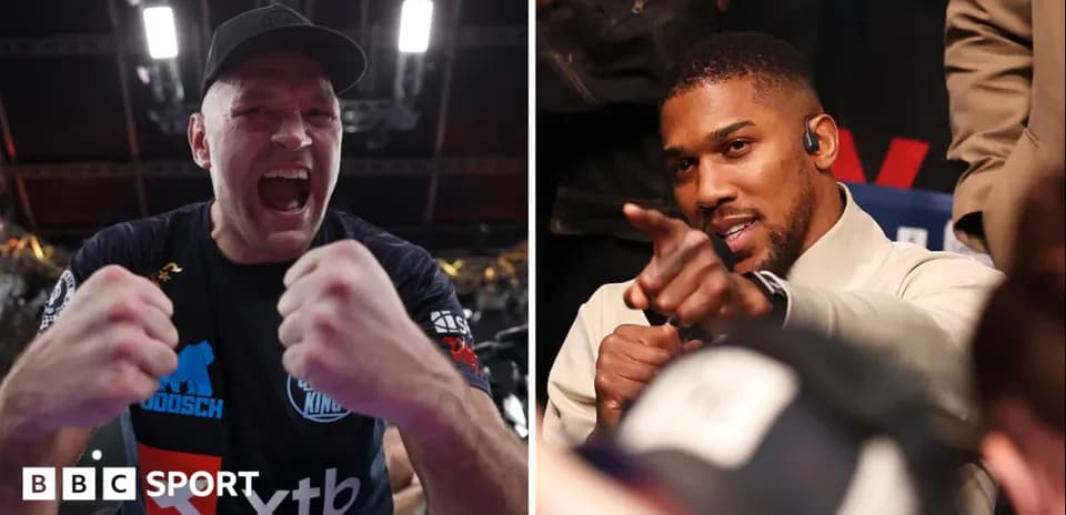 Tyson Fury celebrating, Anthony Joshua pointing in audience