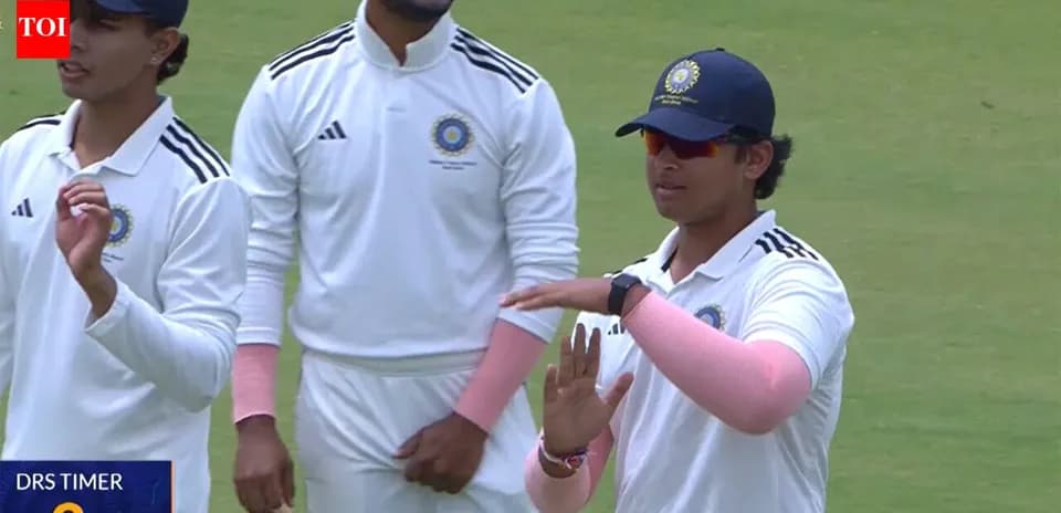 Jugadores de cricket de India en el campo