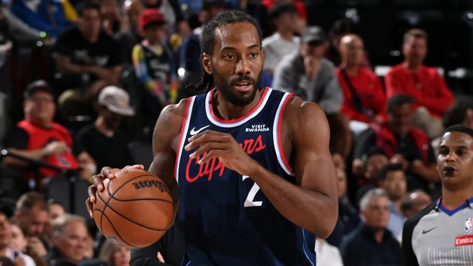 Kawhi Leonard dribbling basketball during game