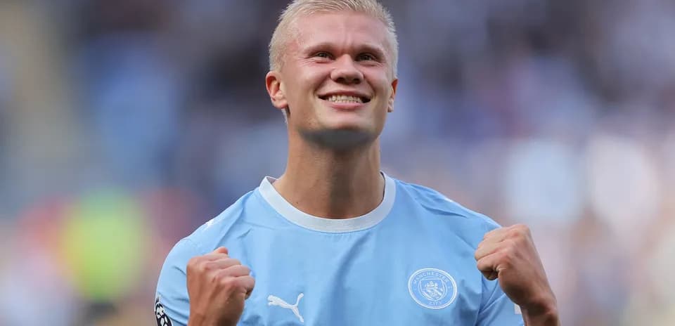 Jugador de Manchester City celebrando en el campo