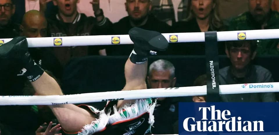 Boxer falling from the ring during match