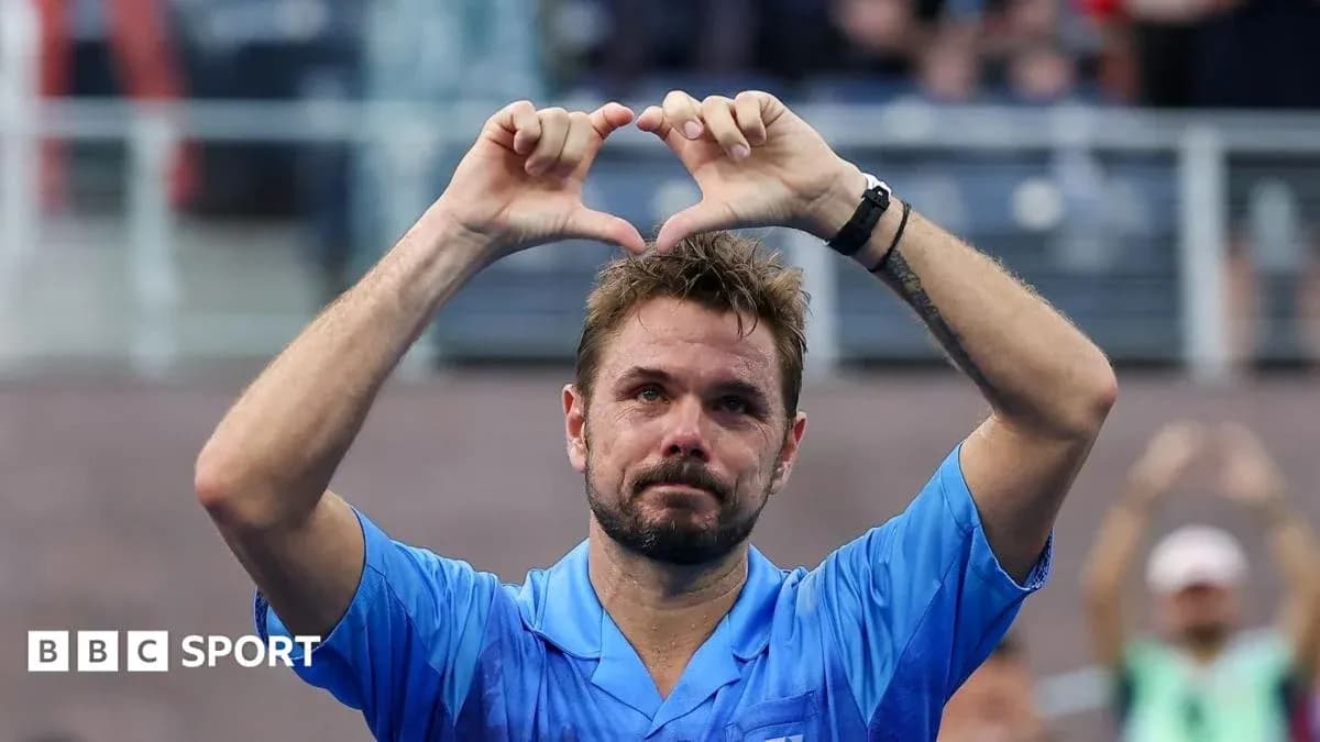 Jugador de tenis haciendo un corazón con las manos