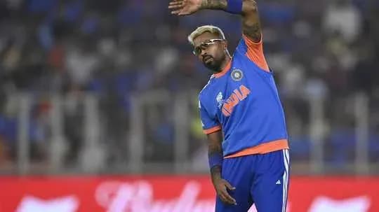 Jugador de cricket de India saludando al público