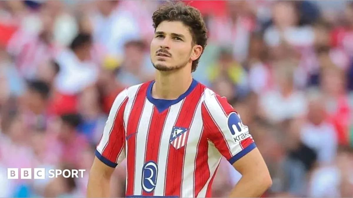 Jugador de Atlético de Madrid en acción durante partido