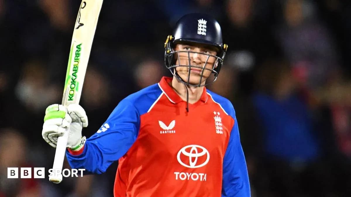 Jugador de cricket con bate celebrando en el campo