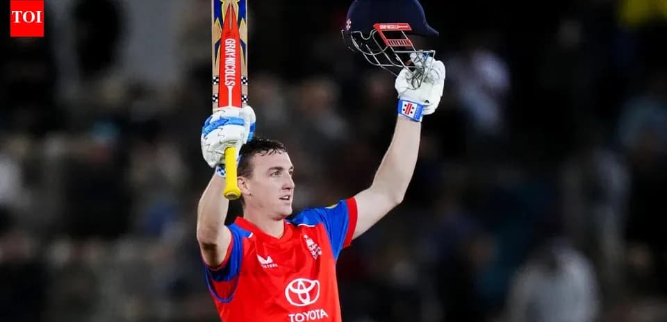 Jugador de cricket levantando su bate tras una victoria