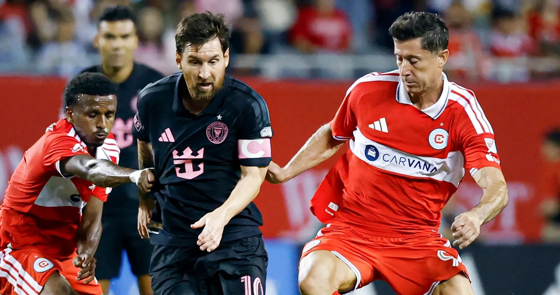 Lionel Messi dribbling past defenders during match Lionel Messi dribbling past defenders during match