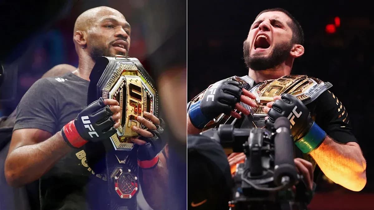 Dos peleadores sosteniendo cinturones de campeón de UFC Dos peleadores sosteniendo cinturones de campeón de UFC